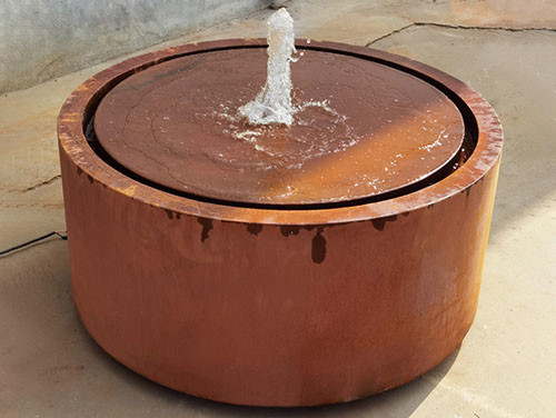 Il giardino decorativo del metallo del diametro 600mm orna la superficie freatica d'acciaio di Corten