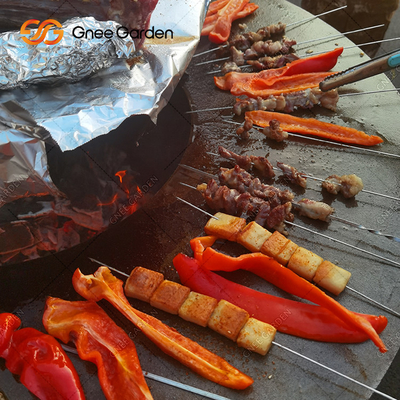 Fuoco d'acciaio Pit With Firewood Storage Backyard Rusty Colour di Corten del BARBECUE all'aperto