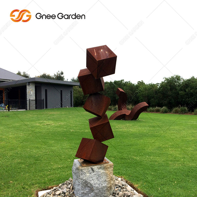 La scultura d'acciaio di Corten del blocchetto del pericolo ha arrugginito sculture del giardino del metallo per prato inglese